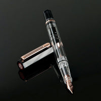 TWSBI Eco Smoke Rose Gold Fountain Pen - un membrete